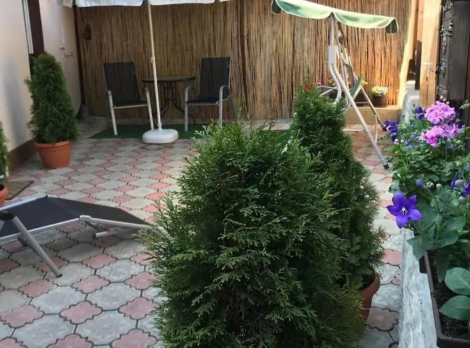 Casa Printre Gradini *